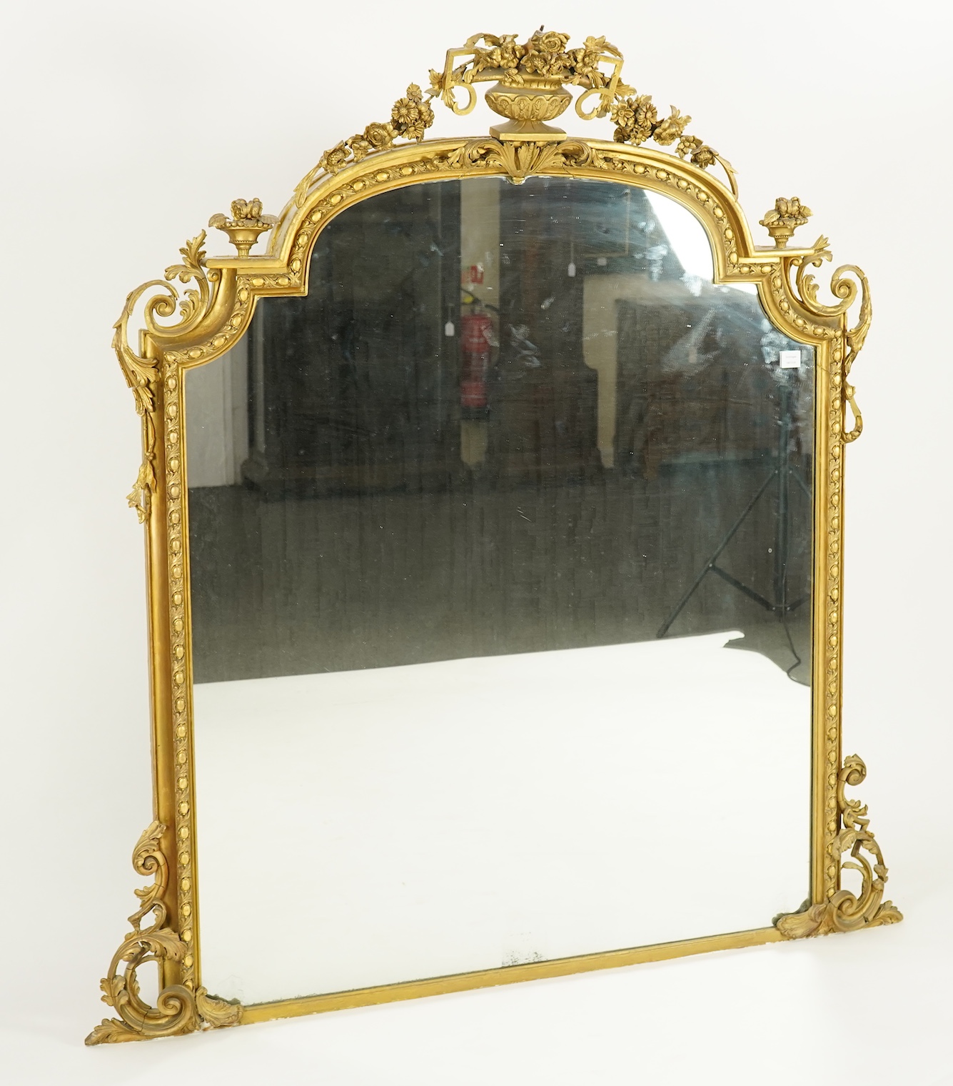 A Victorian giltwood and composition overmantel mirror